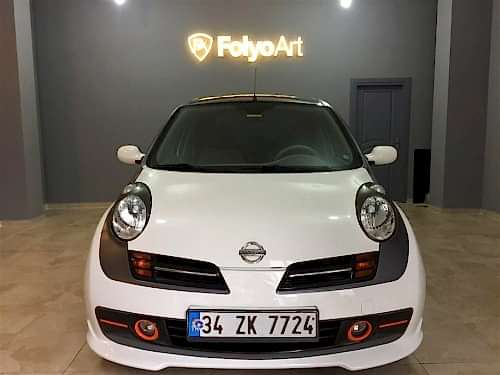 nissan micra araç kaplama cam filmi şerit kaplama turuncu gri siyah (1)