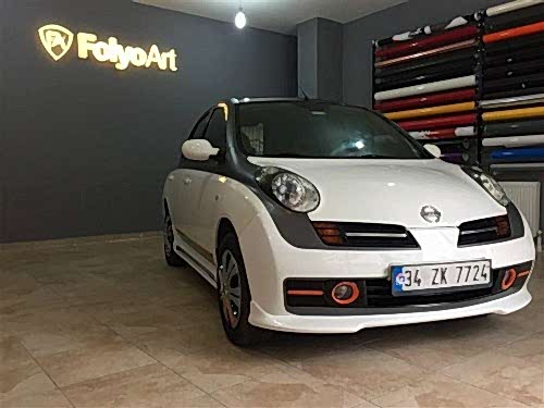 nissan micra araç kaplama cam filmi şerit kaplama turuncu gri siyah (14)