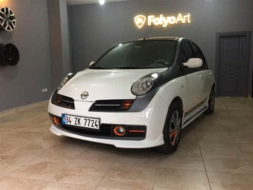 nissan micra araç kaplama cam filmi şerit kaplama turuncu gri siyah (7)