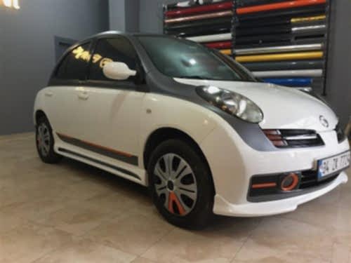 nissan micra araç kaplama cam filmi şerit kaplama turuncu gri siyah (9)