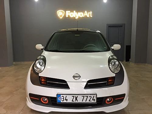 nissan micra araç kaplama cam filmi şerit kaplama turuncu gri siyah (1)