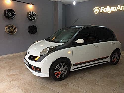 nissan micra araç kaplama cam filmi şerit kaplama turuncu gri siyah (11)