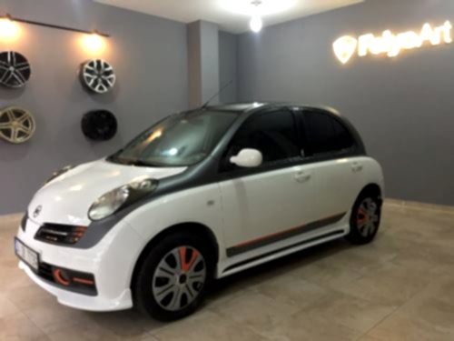 nissan micra araç kaplama cam filmi şerit kaplama turuncu gri siyah (3)