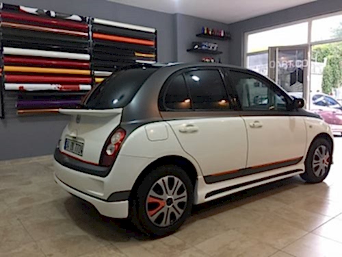 nissan micra araç kaplama cam filmi şerit kaplama turuncu gri siyah (6)