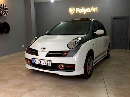 nissan micra araç kaplama cam filmi şerit kaplama turuncu gri siyah (7)