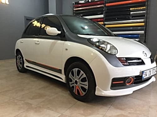 nissan micra araç kaplama cam filmi şerit kaplama turuncu gri siyah (9)